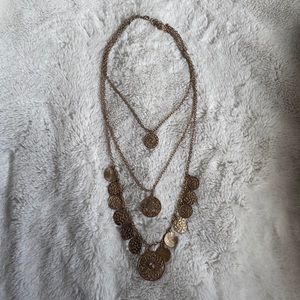 Gold layered medallion necklace